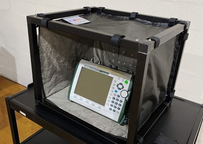 RF shielded EMC cabinet featuring open face for test equipment access.